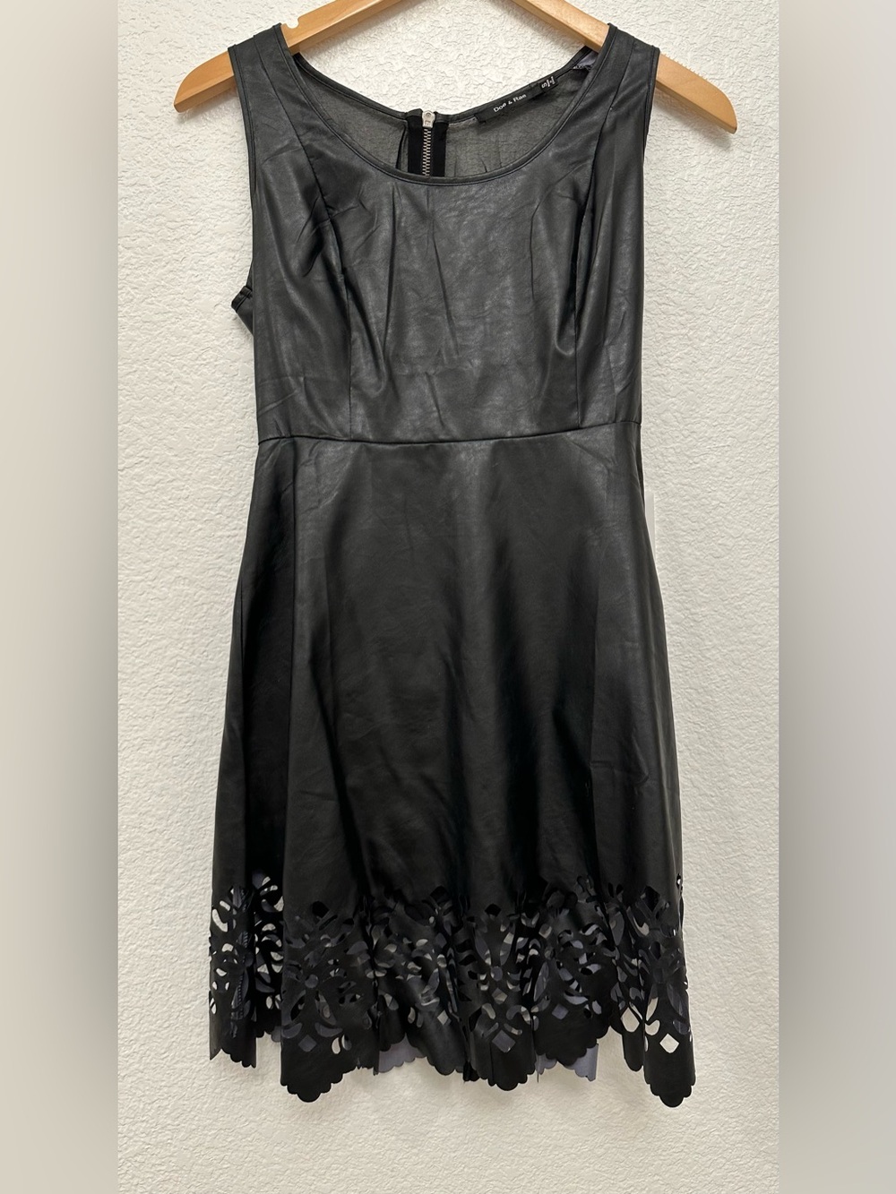 Sleeveless Black Faux Leather A-Line Dress with Laser-Cut Hem